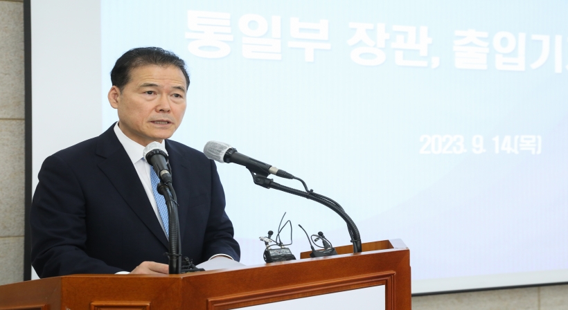 Minister Kim Yung Ho attends a press conference
